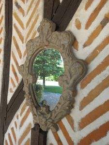 Ancien miroir plâtre patiné